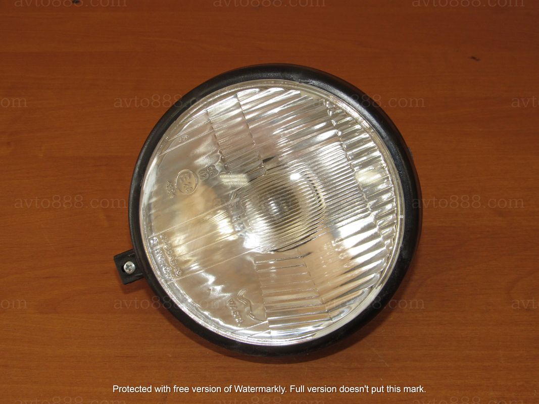 ТРАКТОР фара пер. з пласт. корп.